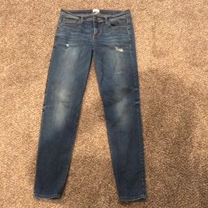Sneak Peek lightly distressed skinny jean. Size 5